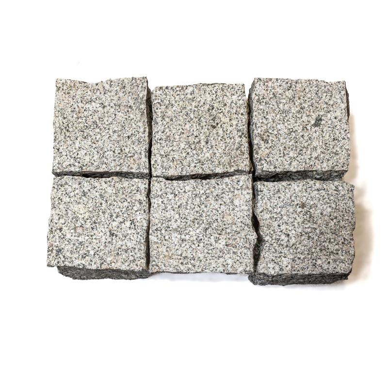 Granit Pflasterwürfel - 9x9x8 cm, Oberfläche gesägt und fein gestockt, Kanten gespalten Granit Pflasterwürfel - 9x9x8 cm, Oberfläche gesägt und fein gestockt, Kanten gespalten